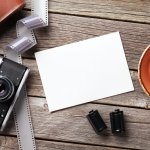 Vintage camera and blank photo frame